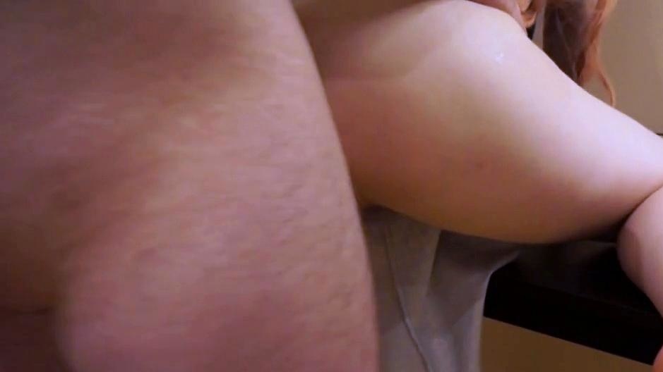 Fucking a redhead's juicy ass on the table
