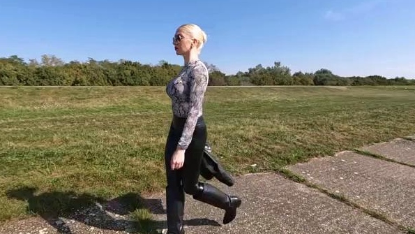 Leather Love - Katya Walking Outdoors In Three Leather